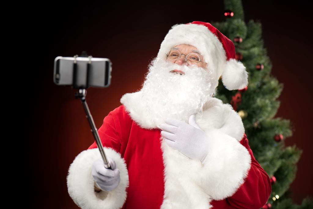 Père Noël prenant selfie
   - Photo, image