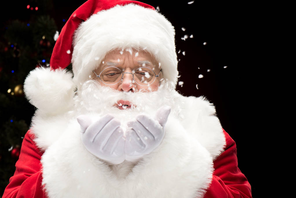 Santa Claus foukání sněhové vločky   - Fotografie, Obrázek