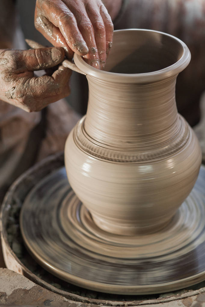 Potter working a piece of clay - Photo, Image