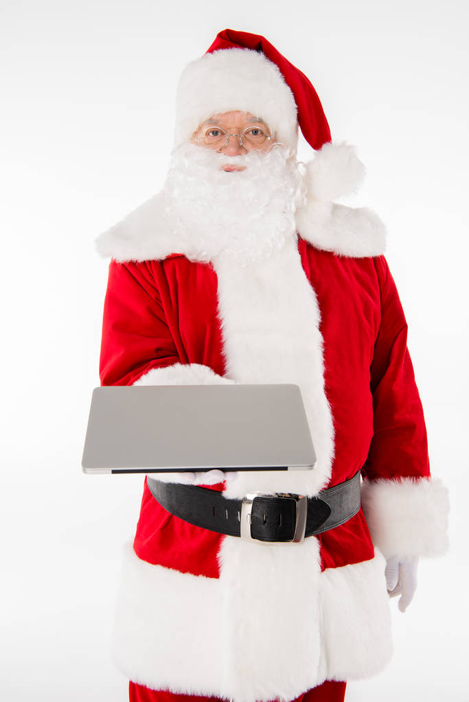 Санта Клаус показує ноутбук
 - Фото, зображення
