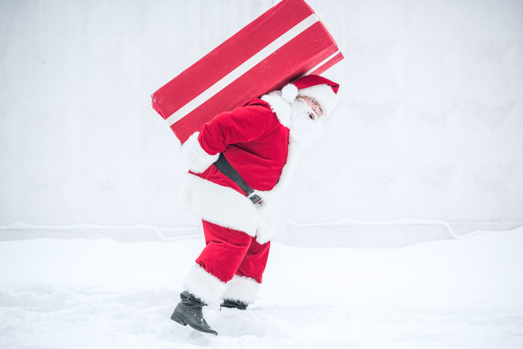 Santa Claus vervoeren geschenkdoos - Foto, afbeelding
