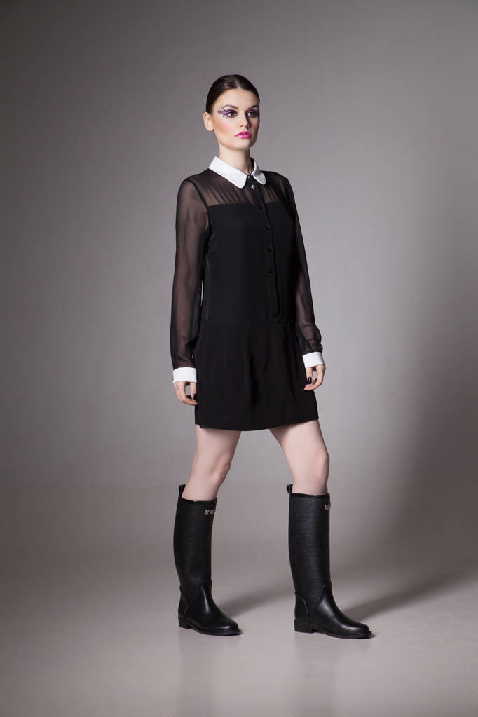 Fashion Image young woman in a stylish black dress. - Photo, Image
