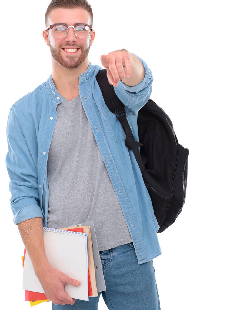Mladý muž stojící s kabelku izolovaných na bílém pozadí - Fotografie, Obrázek
