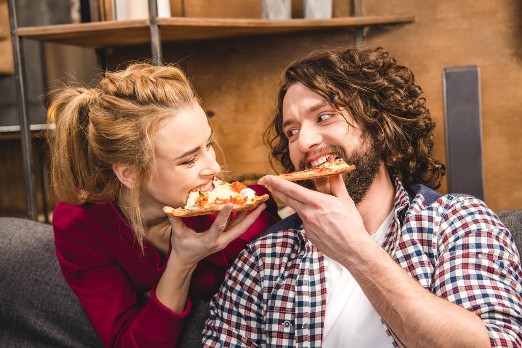 couple eating pizza  - Photo, Image