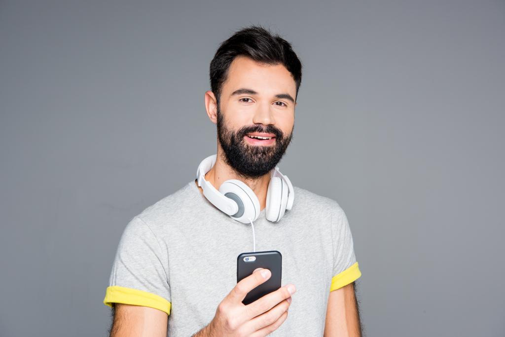 Bearded man using smartphone   - Photo, Image