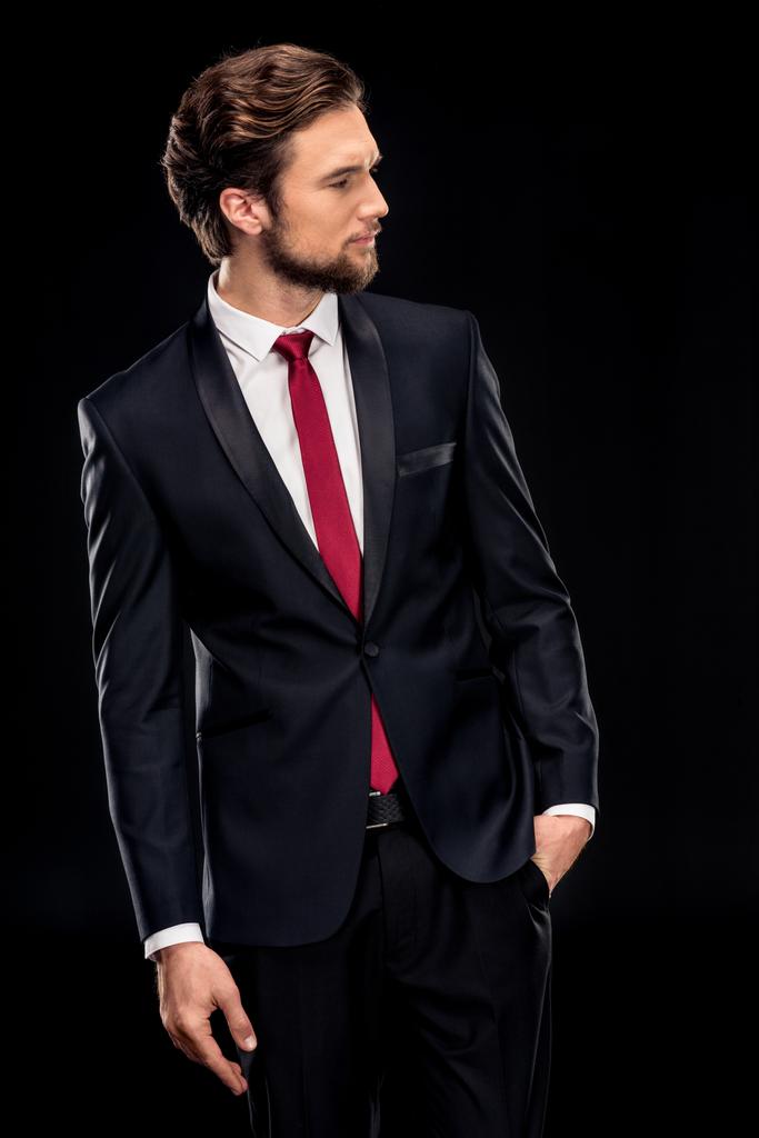 όμορφος επιχειρηματία στο μαύρο κοστούμι  - Φωτογραφία, εικόνα