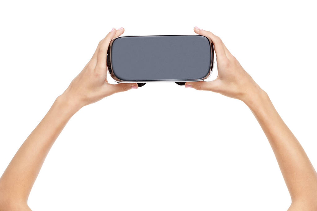 Handen van vrouw met VR-bril - Foto, afbeelding