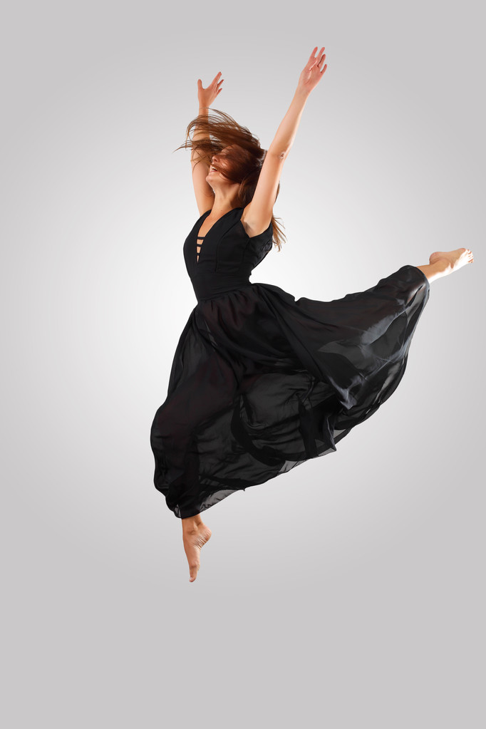 Jovem dançarina saltando
 - Foto, Imagem