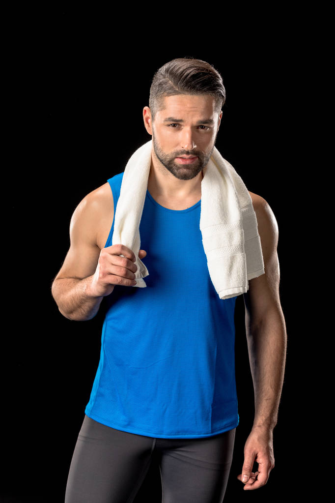 Esportista com toalha no pescoço
 - Foto, Imagem