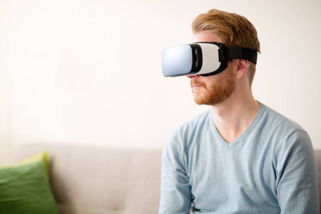 Man wearing future technology VR glasses - Photo, Image