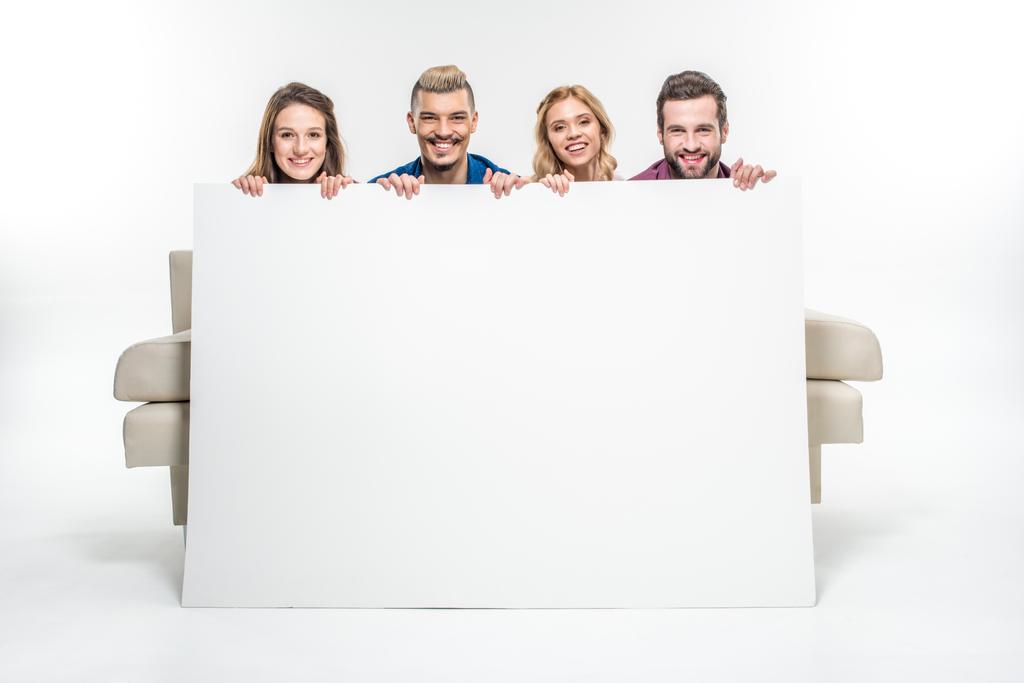Friends holding blank card   - Photo, Image