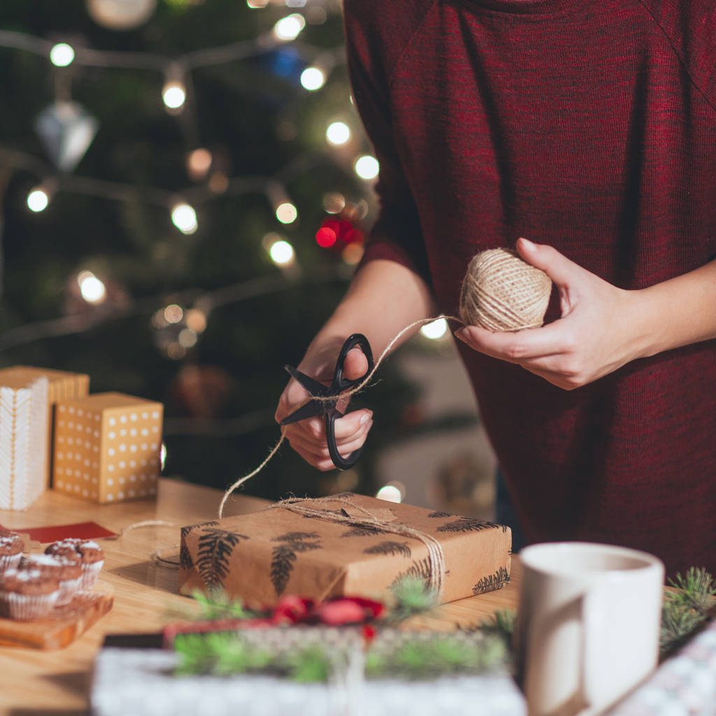 Woman Wrapping Christmas Present - Photo, Image
