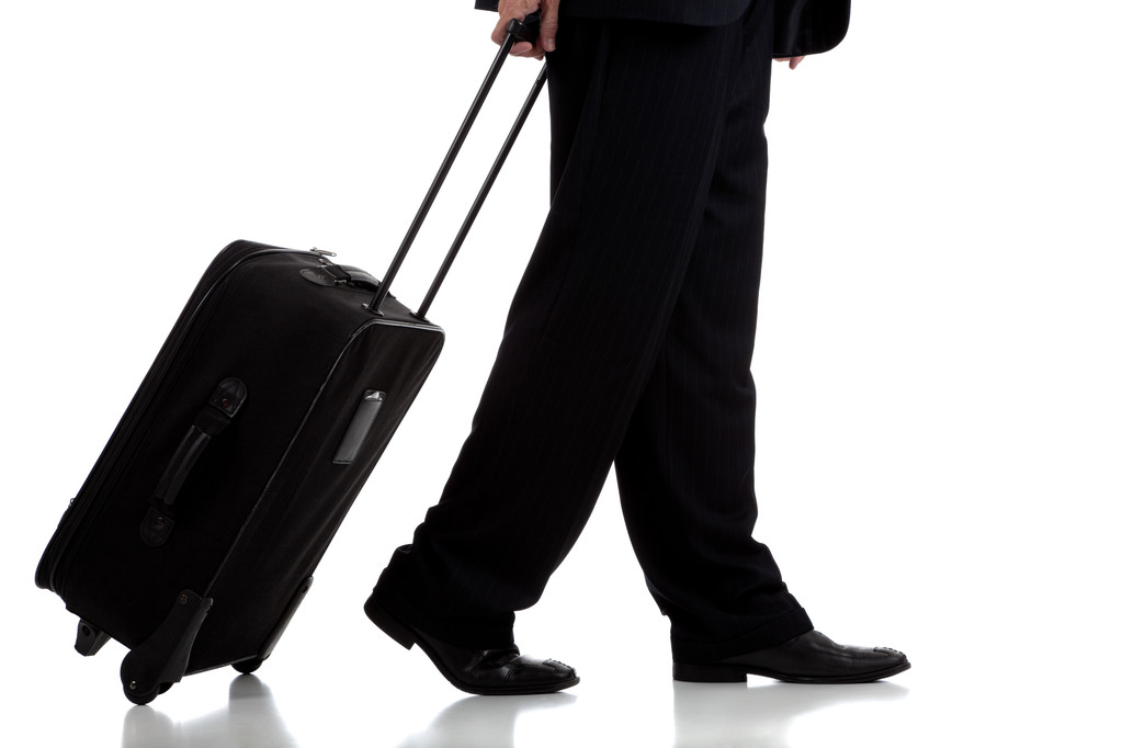 Viaggiatore business o pilota con valigia
 - Foto, immagini