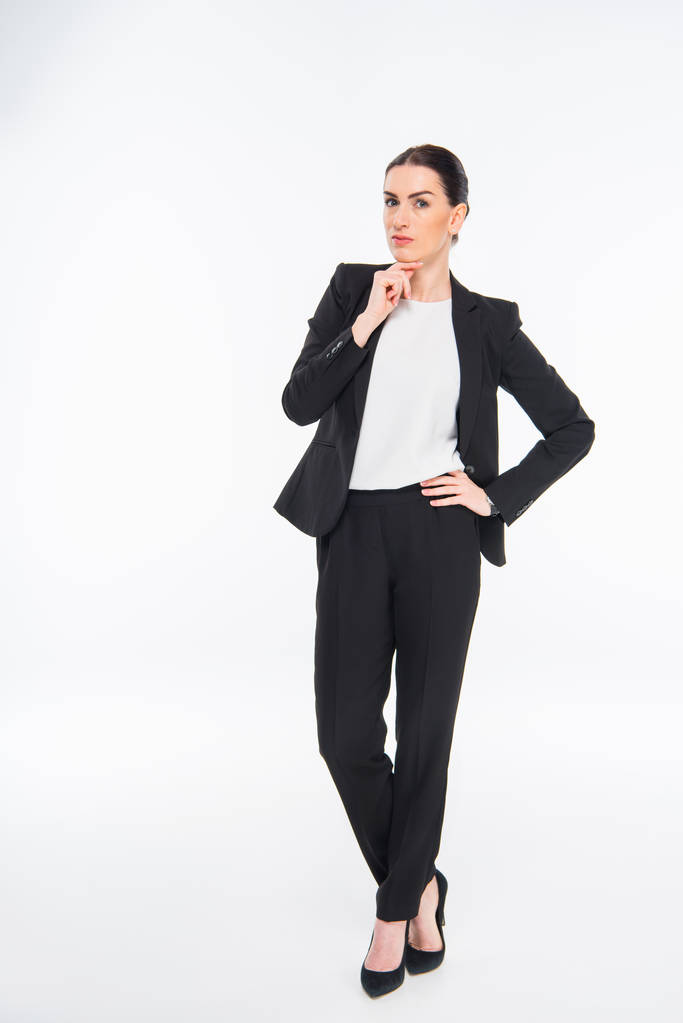 Attractive businesswoman with hand on chin - Photo, Image