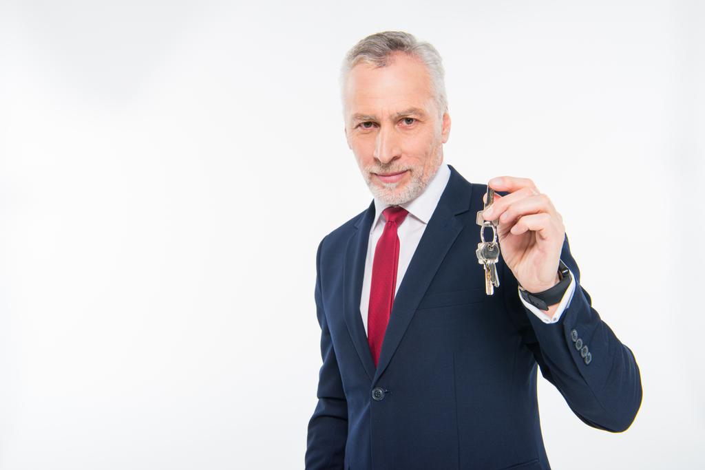 Бизнесмен с ключами
   - Фото, изображение