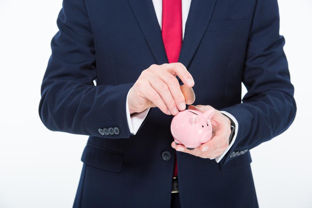 Businessman with piggy bank - Photo, Image