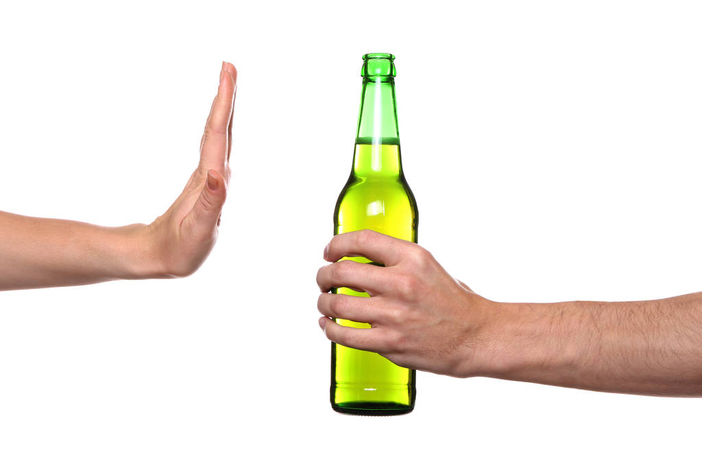 Weibliche Hand verweigert Flasche  - Foto, Bild
