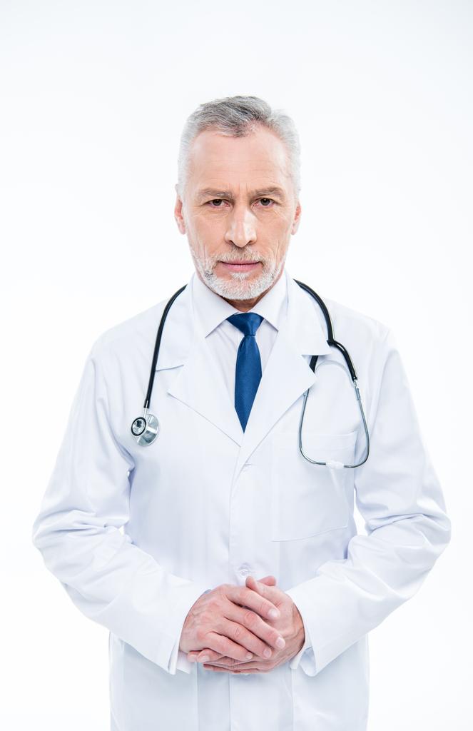 Зрілий лікар зі стетоскопом
 - Фото, зображення