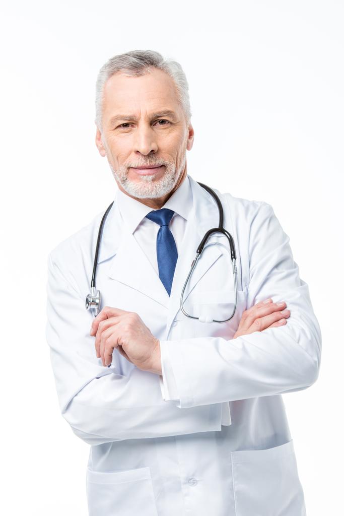 Зрелый врач со стетоскопом
  - Фото, изображение