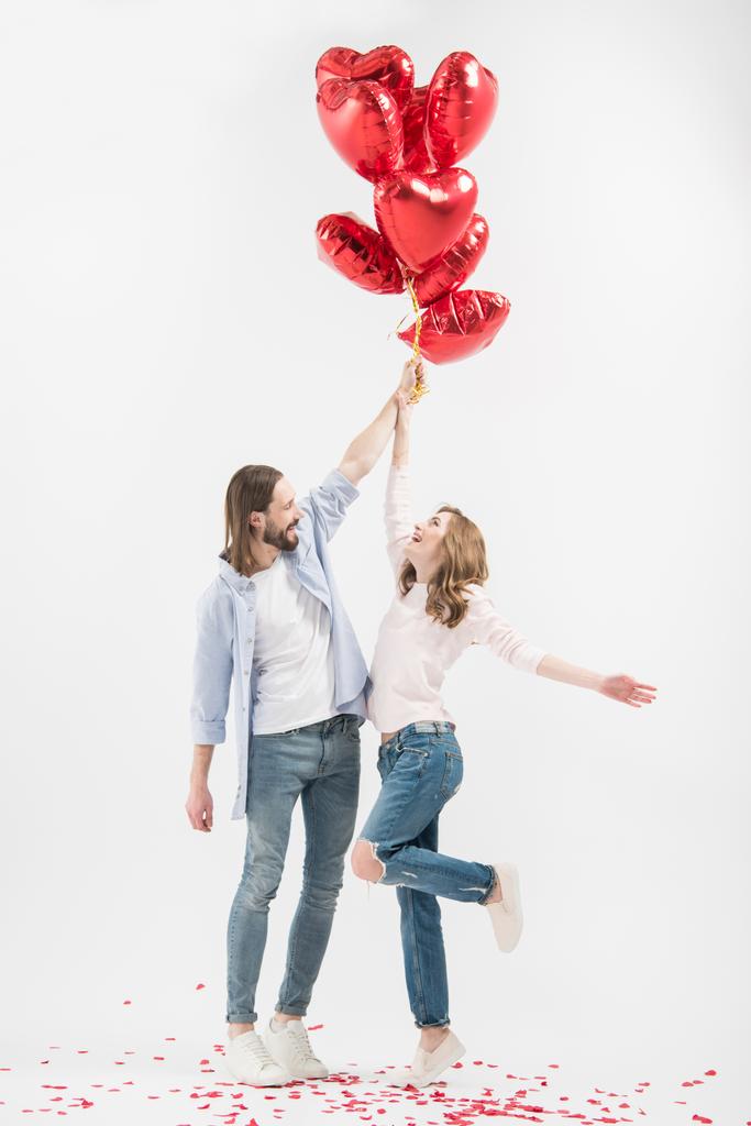 Casal com balões de ar
 - Foto, Imagem