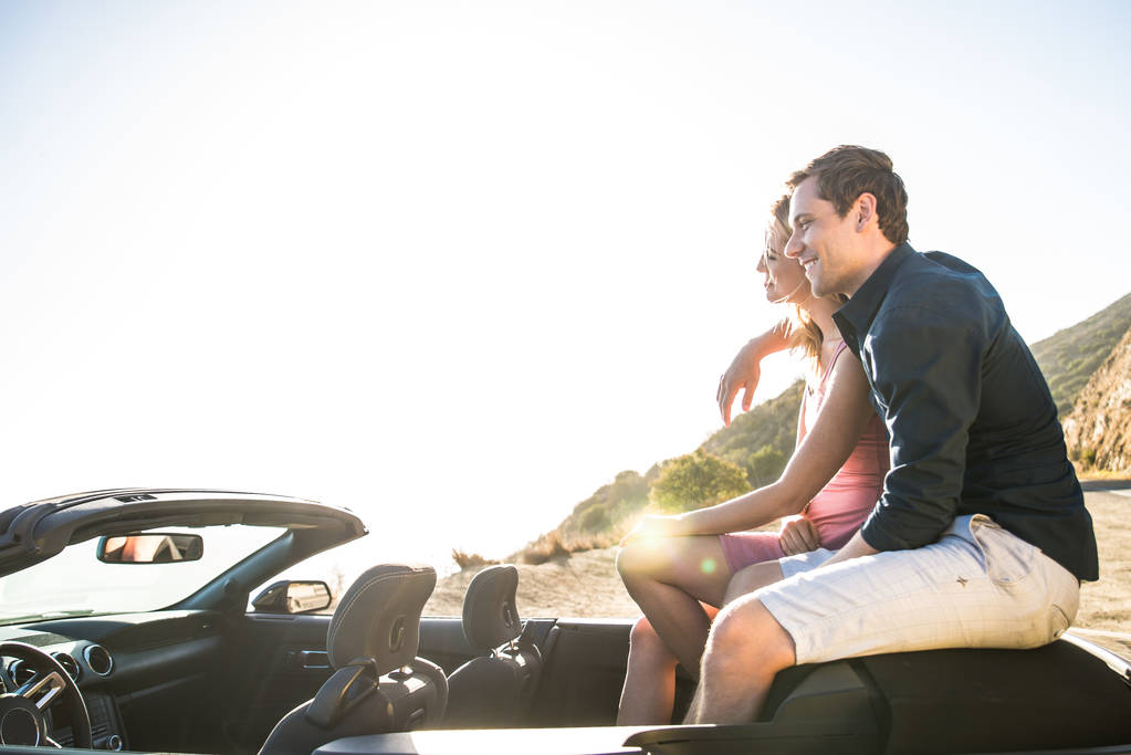 Couple on convertible car - Photo, Image