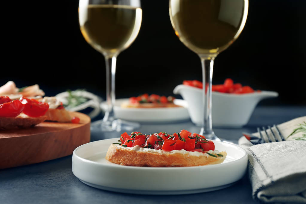 Tasty bruschetta served with wine - Photo, Image