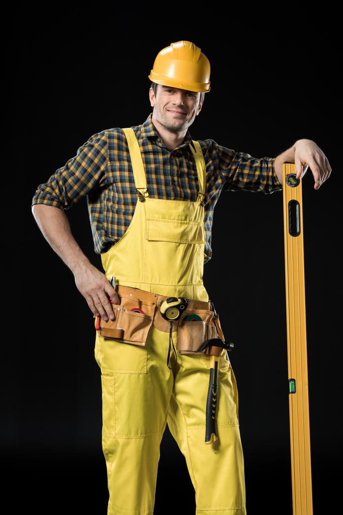 stavební dělník s úrovni tool - Fotografie, Obrázek