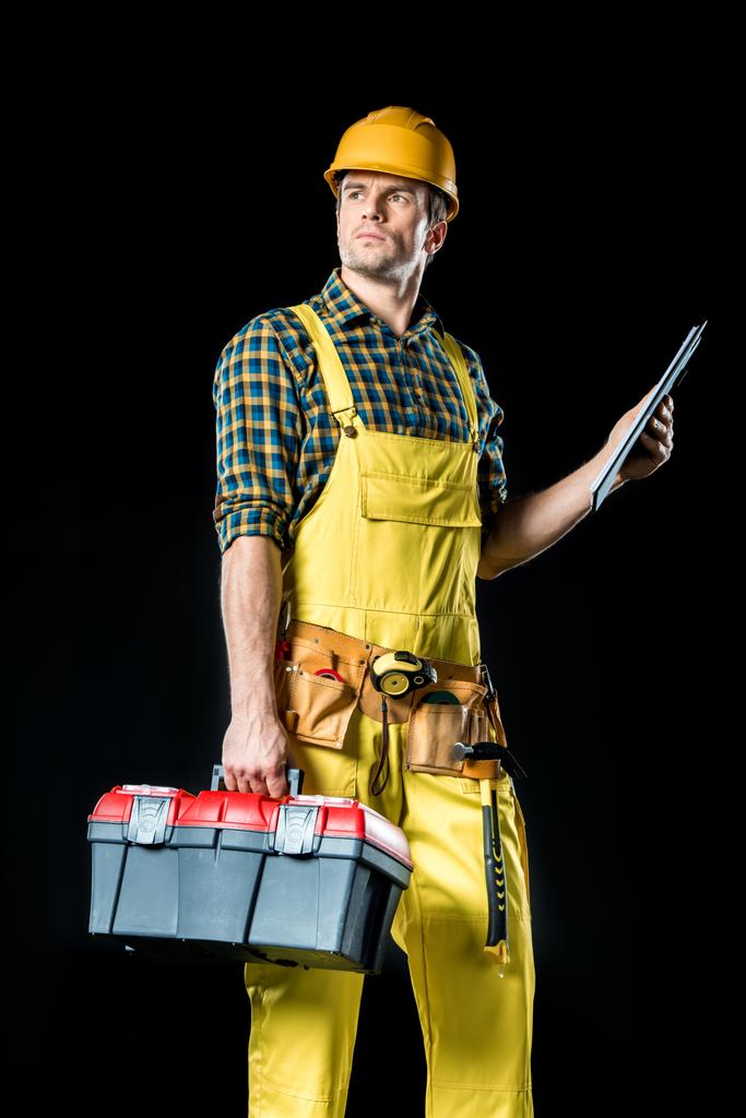 Workman holding gereedschapskist - Foto, afbeelding