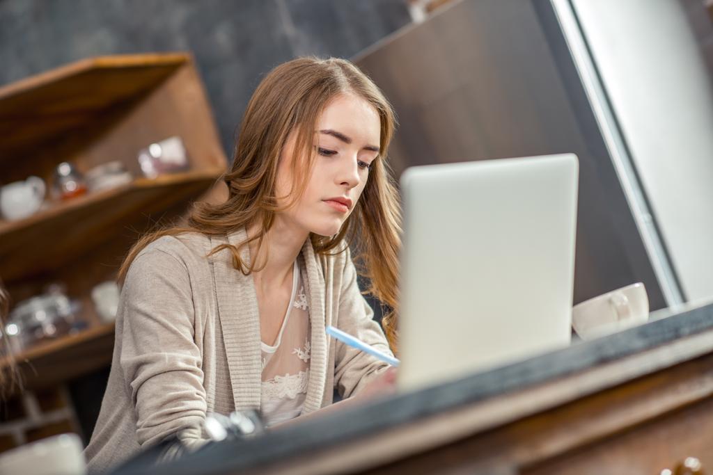 Woman using laptop - Photo, Image