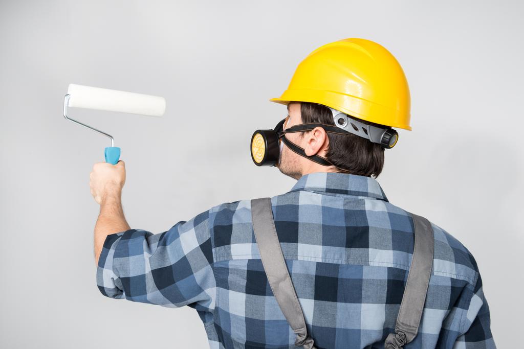 Boya silindirli inşaat işçisi - Fotoğraf, Görsel