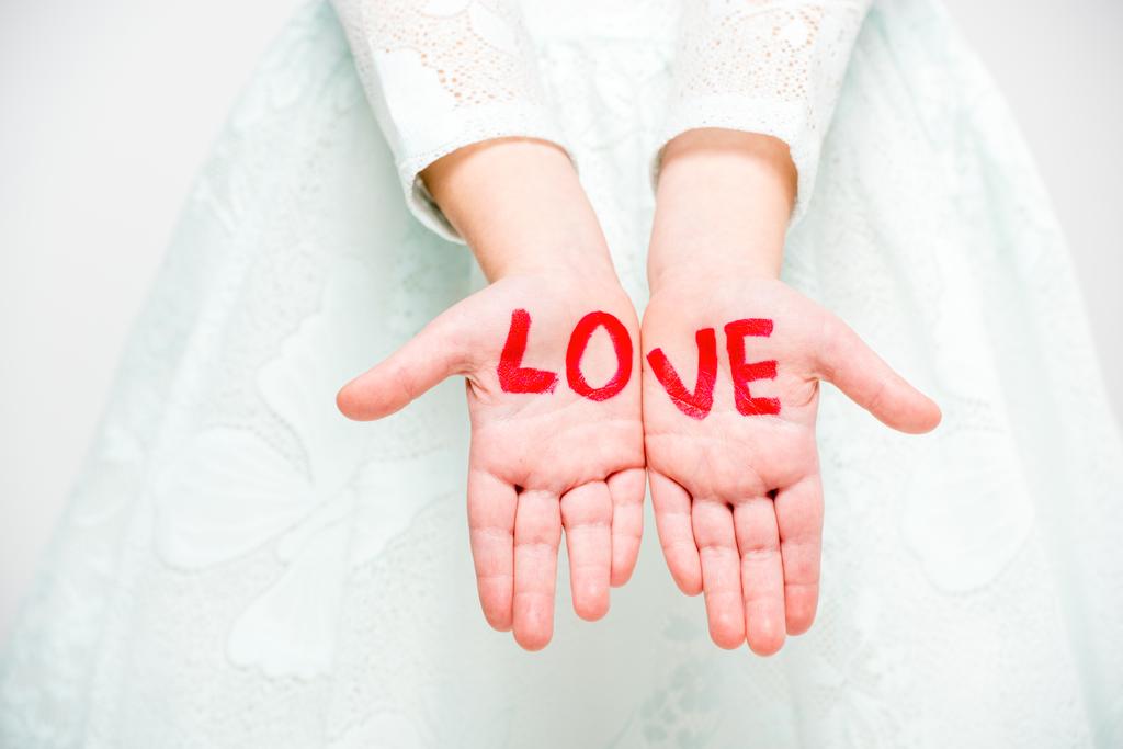 Word love written on palms - Photo, Image