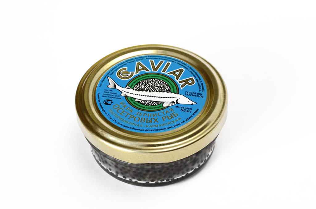 Caviar negro en un frasco sellado
 - Foto, Imagen