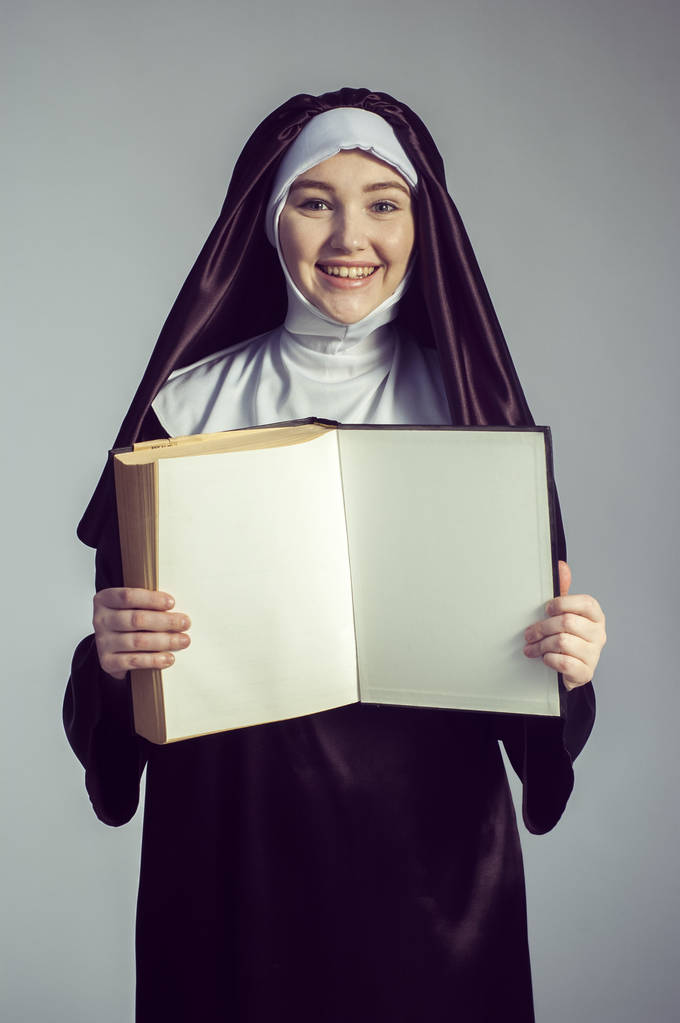 Nun with book - Photo, Image