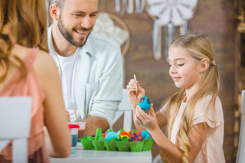 Girl painting Easter eggs   - Photo, Image