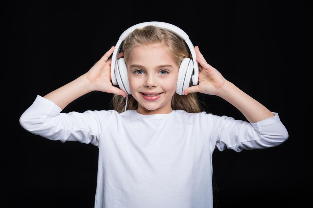 Little girl in headphones - Photo, Image