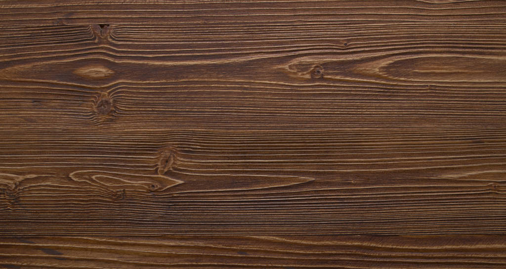la surface en bois est de couleur brun foncé
 - Photo, image