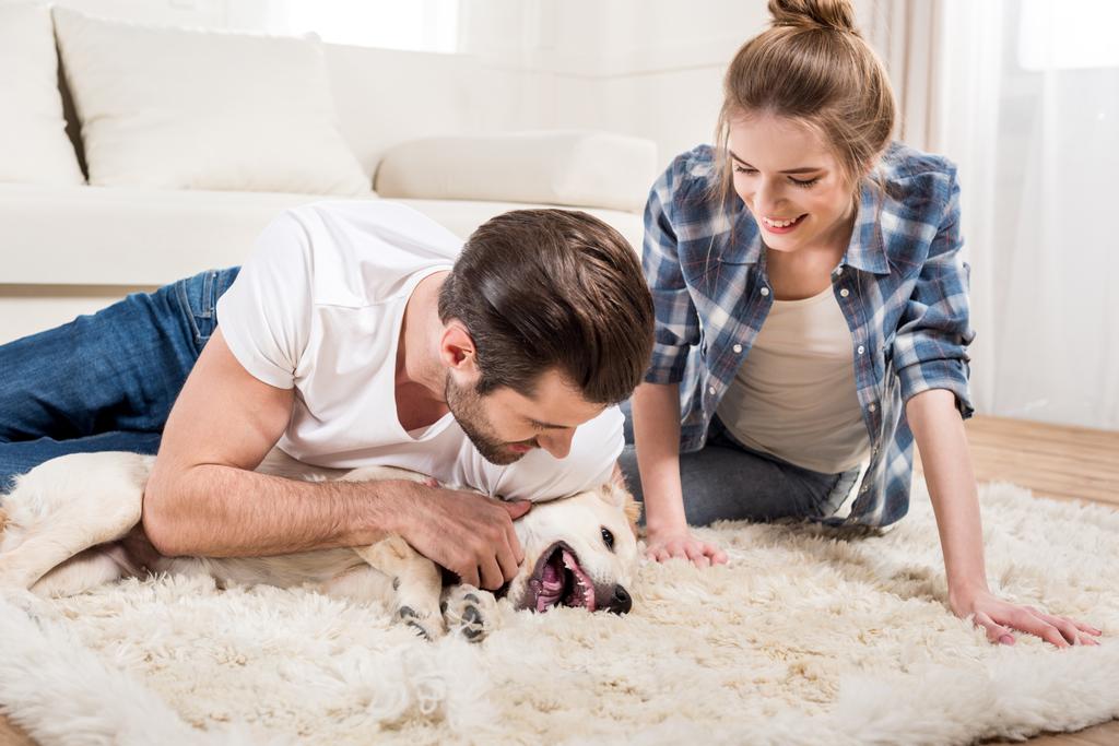 Young couple with puppy  - Photo, Image