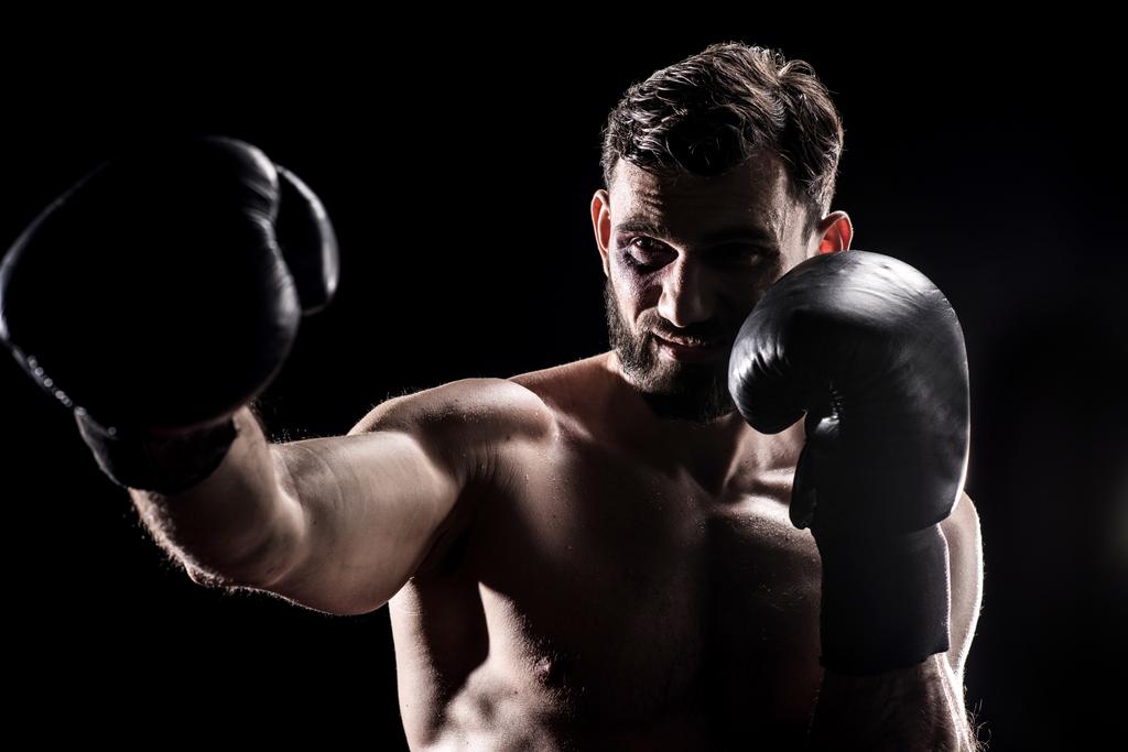 Boxeador joven en guantes
 - Foto, Imagen