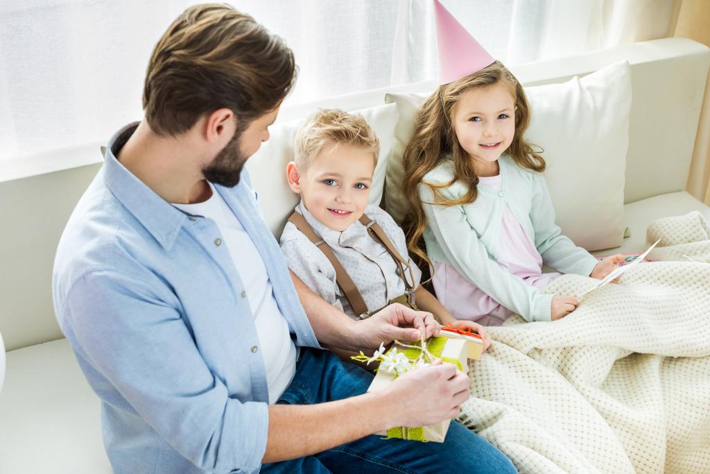 Father and children with presents - Photo, Image