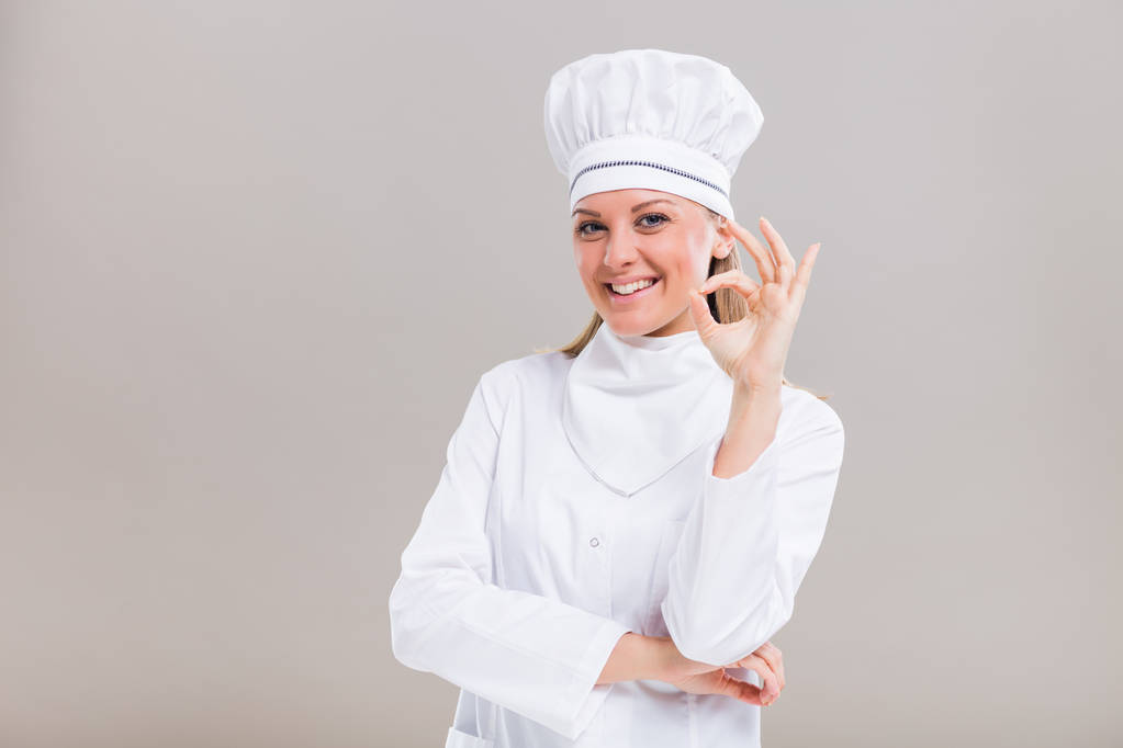 Belo chef feminino mostrando sinal ok
 - Foto, Imagem
