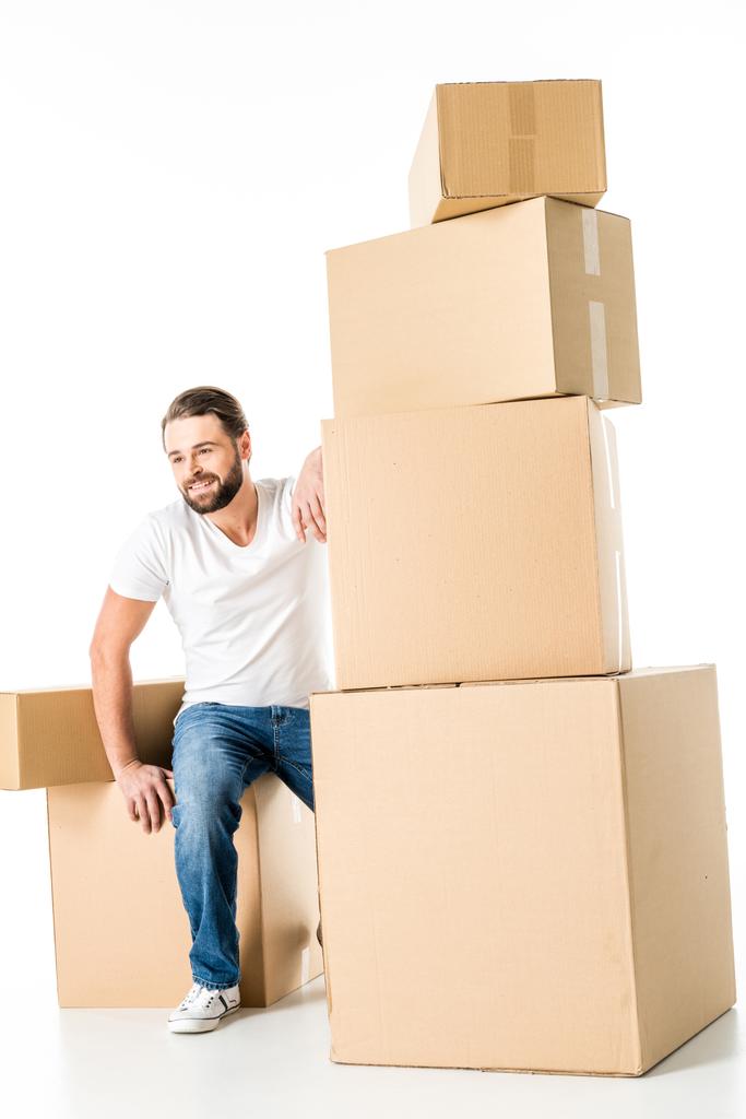 Hombre con cajas de cartón
 - Foto, imagen
