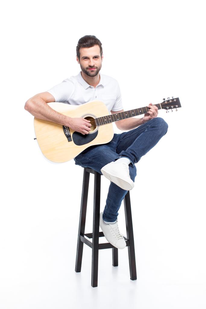 ギターを持つ若い男 - 写真・画像