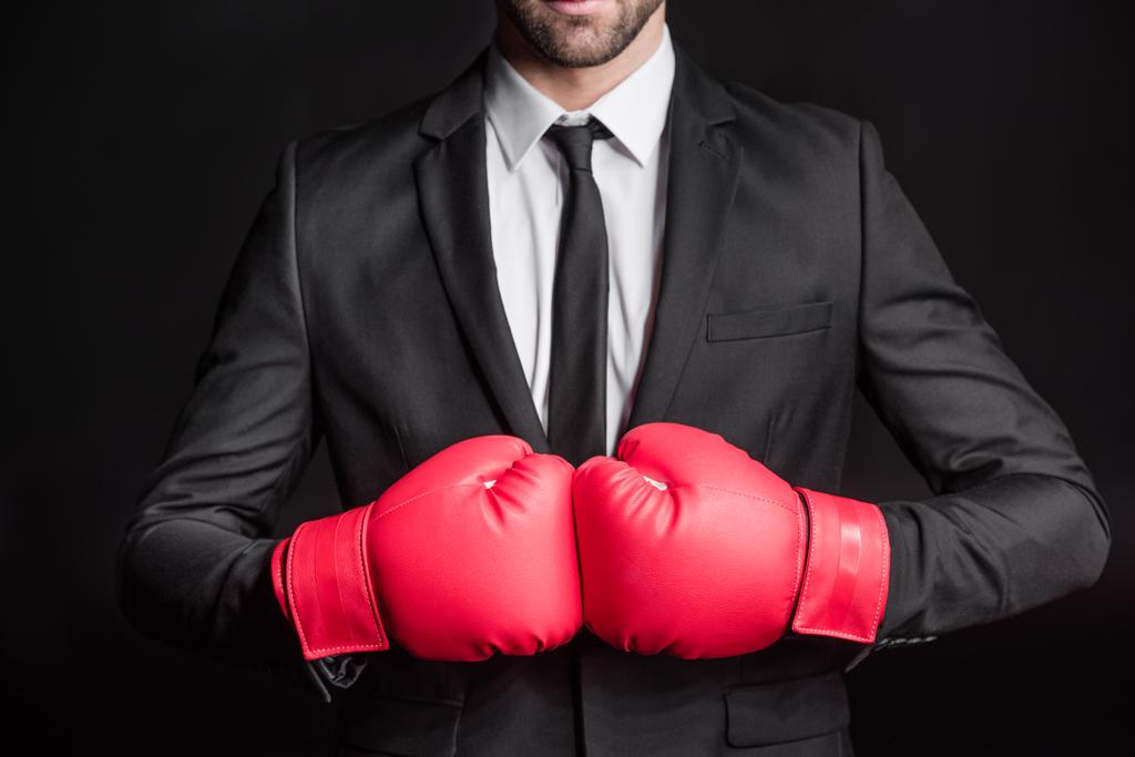 Empresario en guantes de boxeo
 - Foto, Imagen