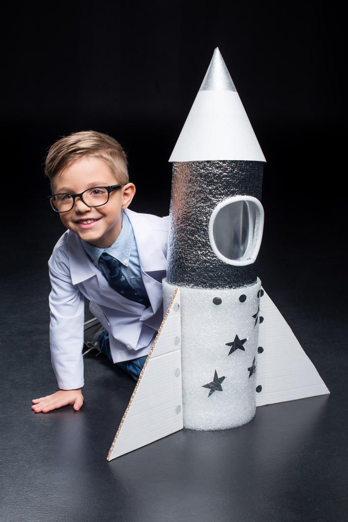 Little boy with rocket - Photo, Image