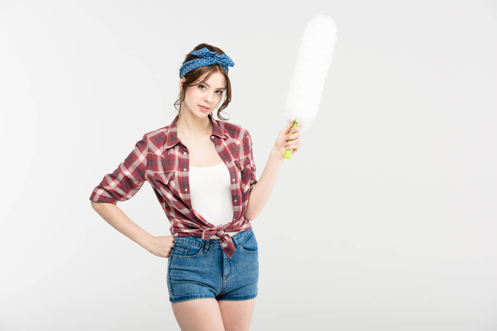 Young woman with duster - Photo, Image