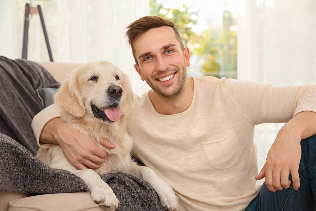 schöner Mann mit Hund - Foto, Bild