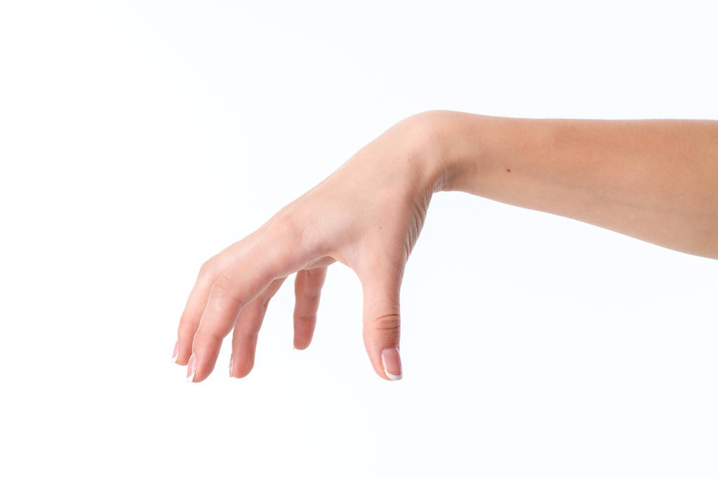 naisten käsi osoittaa ele kämmen alas ja sormet sijoitettu
 - Valokuva, kuva