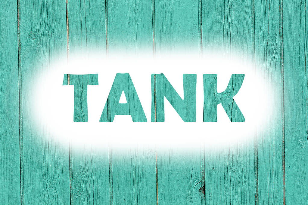 tank word print on the grunge wooden plate - Photo, Image
