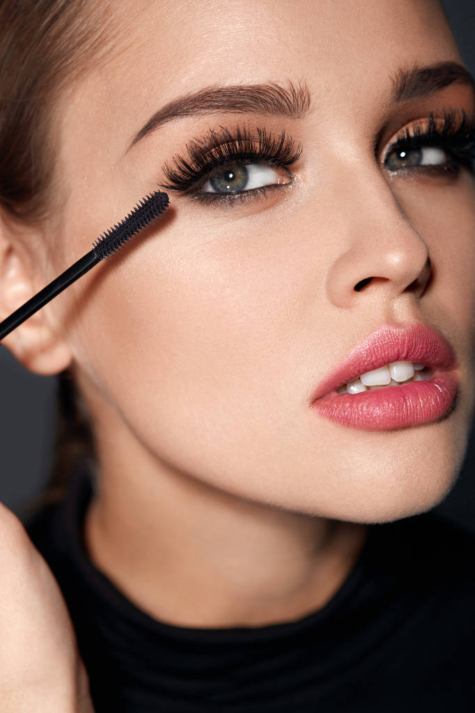 Long Black Eyelashes. Woman With Makeup Applying Cosmetics - Photo, Image