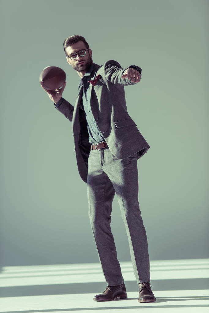 Stylish man with rugby ball - Photo, Image